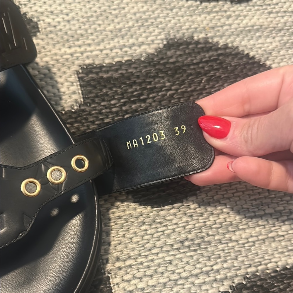 Louis Vuitton “Bom Dia” Black Sandals with Gold Details - Picture 12 of 16